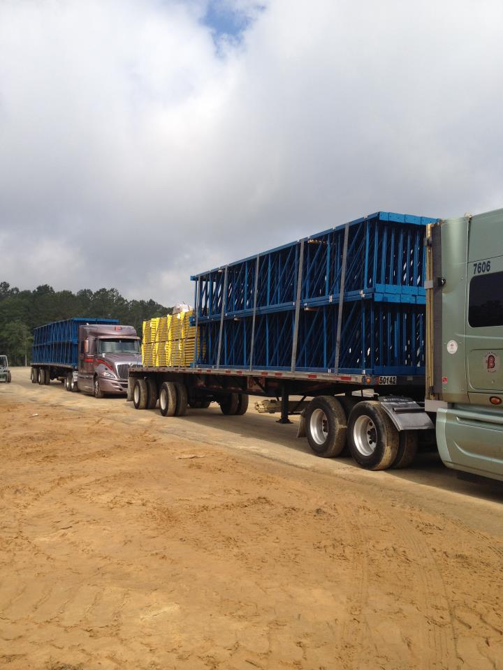 Flatbed of teardrop style pallet racking delivering to Florence, SC.