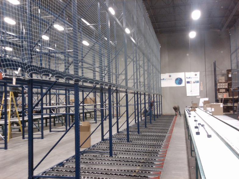 Installation of wire guard and pallet rack in progress - Greensboro, NC