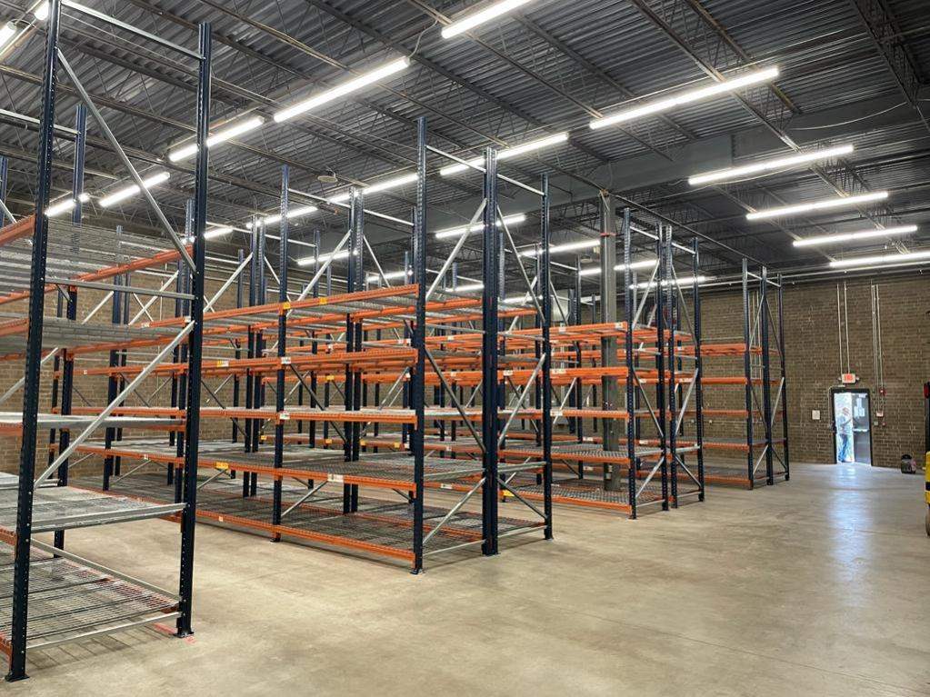 Teardrop style pallet rack and wire deck install in North Carolina
