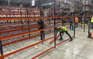 men helping with pallet rack liquidation in North Carolina